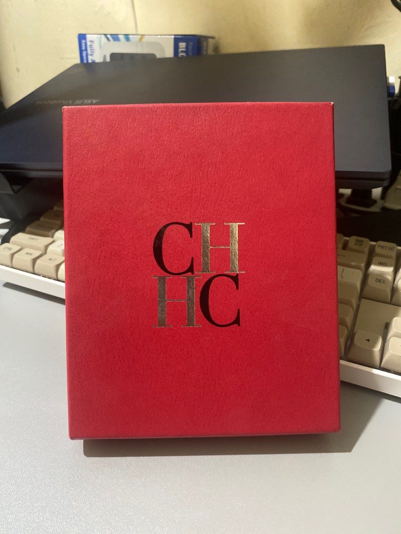 Carolina Herrera with CH insignia compact wallet. (Category: Wallets & Card holders) located in Makati City. Submitted by mycosmos1175267 (Listing ID 1296062197, Image 2). Description: Comes complete box Carolina Herrera box tags and ribbon with CH insignia compact wallet. In lucky red color Location: Makati/ Taguig Can ship via Grab/ Lalamove or GogoExpress Shipping c/o buyer Mode of Paymet: Gcash, BPI, GoTyme, Maya. .