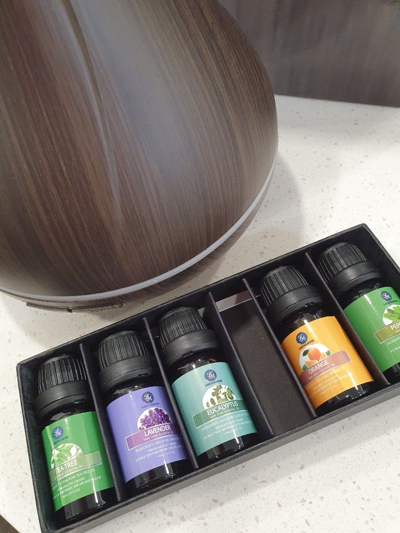 Essential Oil Diffuser (Category: Home Fragrance) located in Singapore. Submitted by mari0825 (Listing ID 1296107643, Image 2). Description: Essential Oil Diffuser. Lightly used, comes with essential oils (opened bottles, not all full).