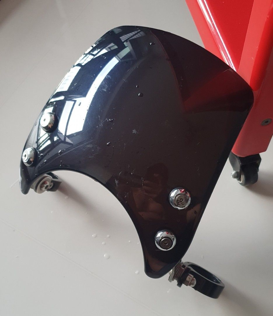 Mini Windshield (Category: Motorcycle Accessories) located in Singapore. Submitted by garage_guy (Listing ID 1296063443, Image 2). Description: Relatively in good condition. Just some clean up. For 41mm forks...if 39mm, just need some rubber to fill up..
