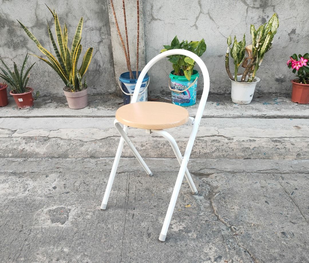 Minimalist Foldable Stool (Category: Chairs) located in Mabalacat. Submitted by thenewcraf32843 (Listing ID 1296173524, Image 2). Description: Minimalist Foldable Stool In good condition. Wooden seat, aluminum frame. 100 kilos capacity. 1 pc only.. Dimensions: Seat diameter 11.5 x Seat height 18.5 x Total height 26 inches Location: Mawaque Mabalacat, Pampanga We do shipping. Mop: Gcash or Landbank. Strictly no reservation and COD. Payment first b