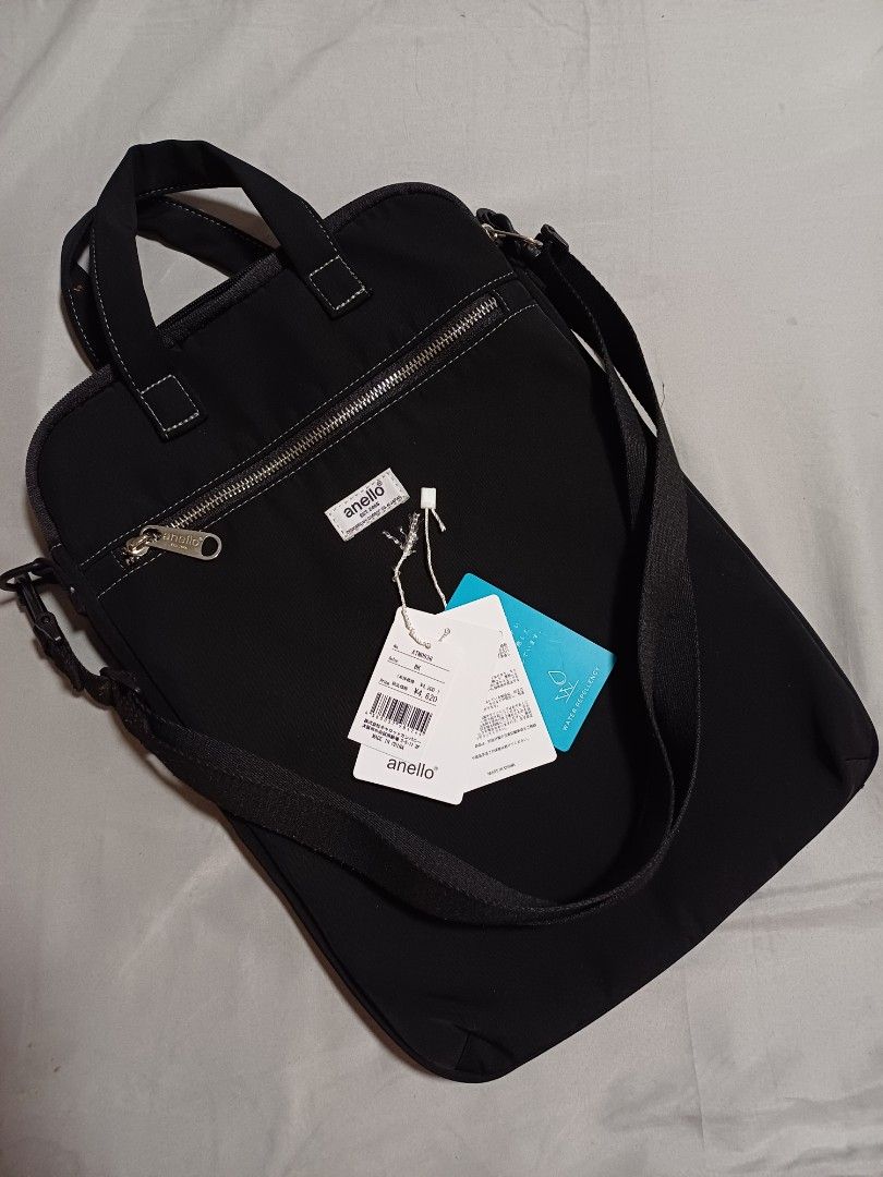 Authentic Anello Black Laptop Bag (Category: Laptop Bags & Sleeves) located in Manila. Submitted by readyzetgo (Listing ID 1297607013, Image 1). Description: a very nice steal! preloved but in EUC fits laptop size up to 15 inches color black water repellalent w detachable shoulder strap bought last Jan in Anello Flagahip store in Osaka unlike the usual laptop bag, orientation of this type is portrait still being sold in JP stores sooo nice in per