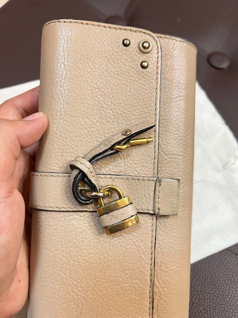 Chloe Long Wallet (Category: Luxury Bags & Wallets) located in Makati City. Submitted by weng_fei (Listing ID 1297663227, Image 2). Description: Well used Authentic 💯 With podlock & key.
