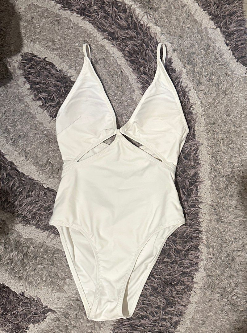 Float Swimwear (Maillot Esa in White) (Category: Bikinis & Swimsuits) located in Manila. Submitted by jenosaur (Listing ID 1297652163, Image 3). Description: With a few yellow stain marks, but hardly noticeable. Perfect for your summer getaway. RFS: Doesn’t fit me anymore. Reasonable offers only, pls. All sales final..