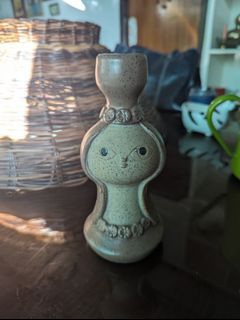 Girl brown candle holder
