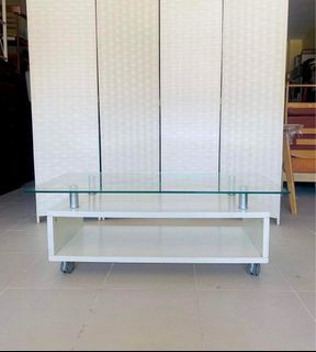 JAPAN SURPLUS FURNITURE  MOVEABLE GLASS CENTER TABLE / TV RACK   SIZE 43.25L x 23.75W x 16.5H in inches   (AS-IS ITEM) IN GOOD CONDITION
