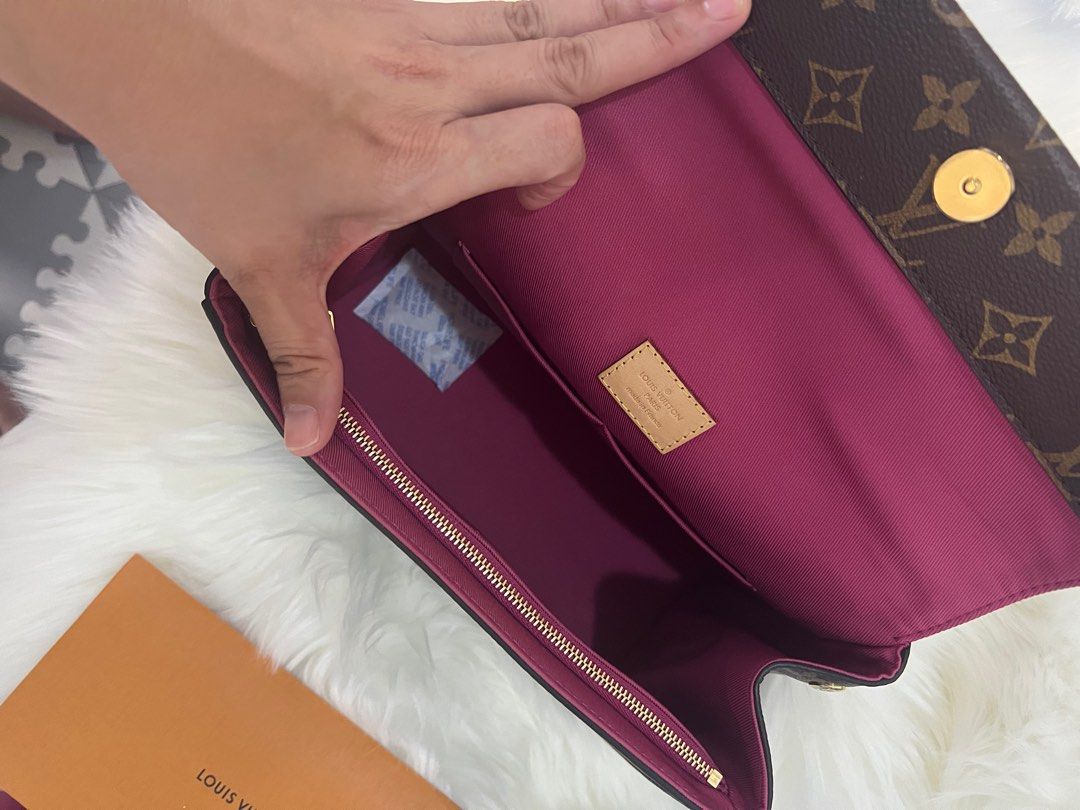 LV CLUNY BB 💯 Authentic (Category: Luxury Bags & Wallets) located in Manila. Submitted by ehnong (Listing ID 1297465022, Image 3). Description: LV Cluny Monogram BB Interior and Strap (Pink) 💯 Authentic **bought directly from the LV store in Paris Casual and neutral handbag. It’s beautifully structured, and can be worn in multiple ways: cross-body, shoulder bag, and handheld. INCLUSION: Complete - with LV Box, Paper bag, Dust bag, Clochette, Bo