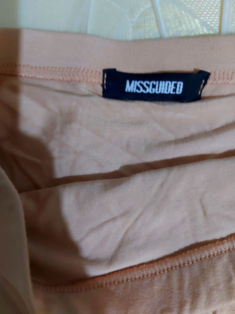 Missguided jersey nude skirt (Category: Skirts) located in Las Pinas. Submitted by s_abiera (Listing ID 1297661897, Image 2). Description: fits small color nude/pink assymetrical at the bottom jersey material.