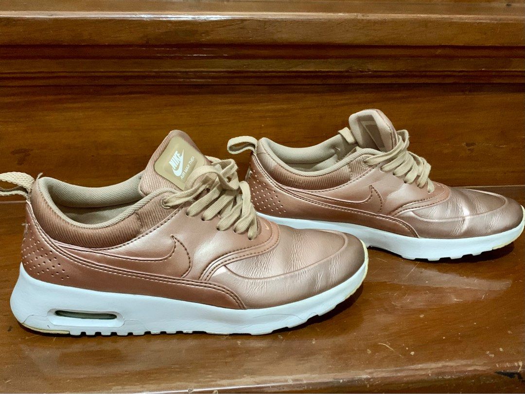 Rose gold nike thea hotsell
