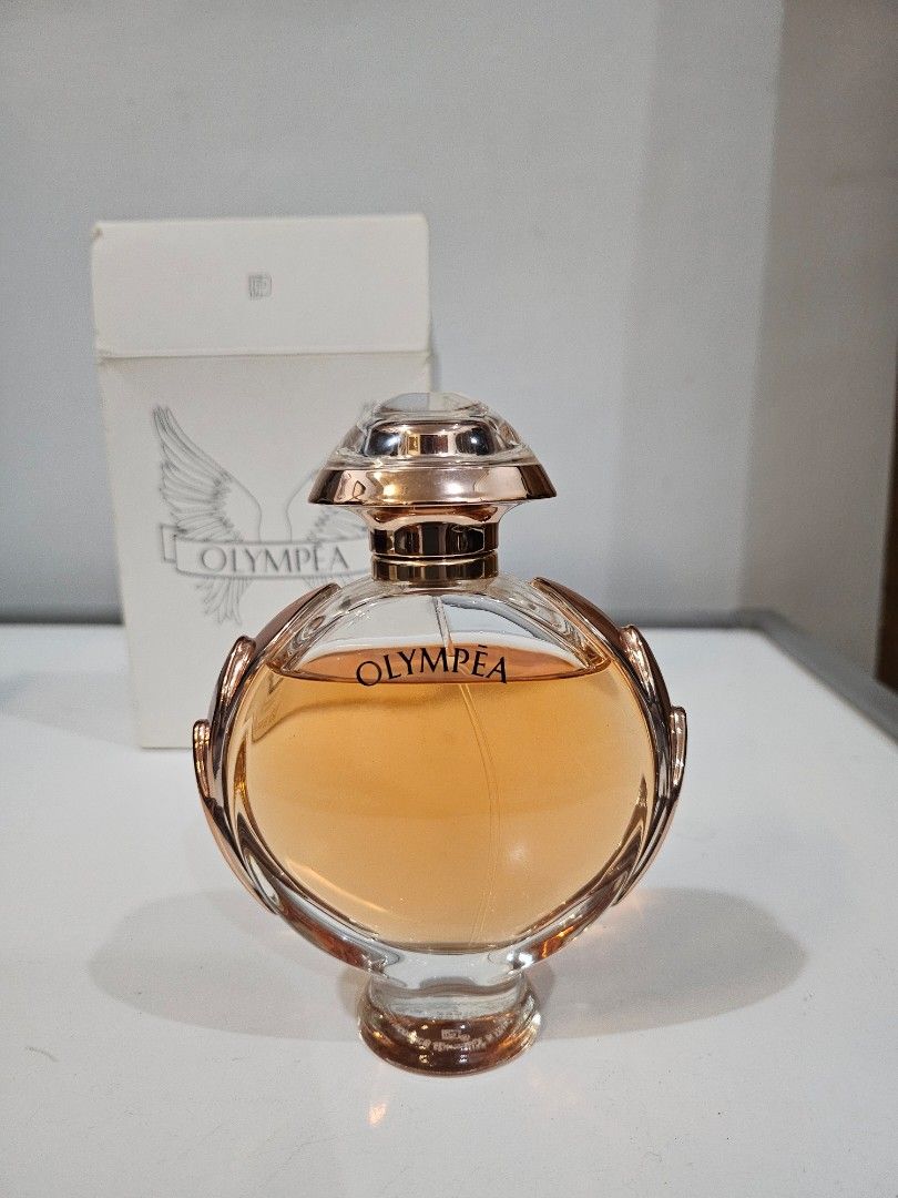 Paco Rabanne Olympea 80ml Tester/ demo box (Category: Fragrance & Deodorants) located in Pasig City. Submitted by hellobillie (Listing ID 1297648169, Image 1). Description: Paco Rabanne Olymepa 80ml FSM Tester/ Demo box Box has flaws, bottle and juice are fine https://www.fragrantica.com/perfume/Paco-Rabanne/Olympea-31666.html.