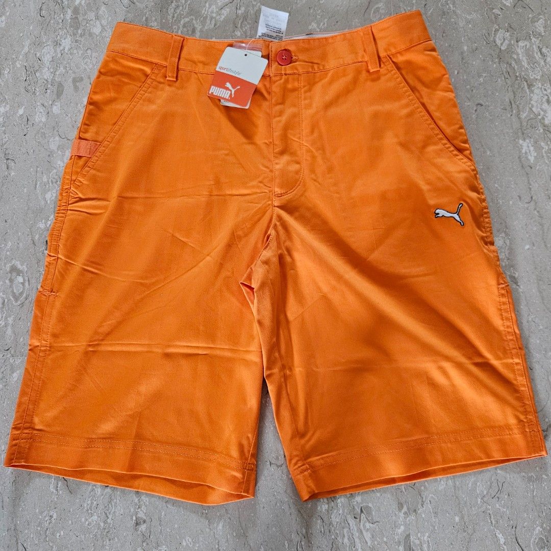Puma orange golf shorts on sale