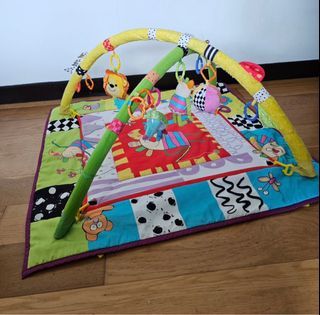 Taf Toys baby gym with hanging toys