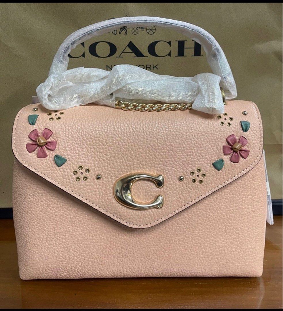 Coach sling bag (Category: Luxury Bags & Wallets) located in Quezon City. Submitted by smartysmart (Listing ID 1297577694, Image 1). Description: Coach sling bag Pebbled leather Medium size Peach/blush Authentic from US🇺🇸 On hand Pinas🇵🇭 Ready to ship Sale.