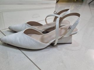 White Pointed Toe Wedge Shoe