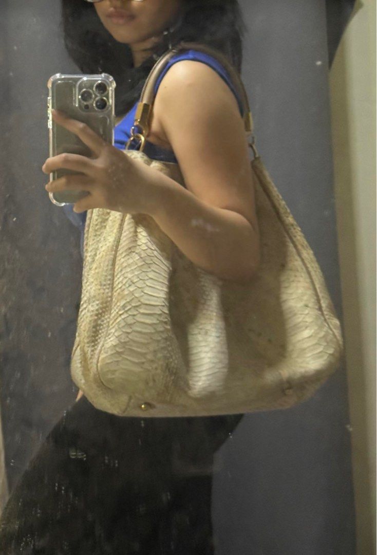 YSL Hobo bag (Category: Luxury Bags & Wallets) located in Valenzuela. Submitted by happyhabit (Listing ID 1297630016, Image 1). Description: Authentic Ysl Hobo Python Leather complete inclusion - Dust bag, leather swatch & card cards RFS: not using anymore - loc: Valenzuela (can do meet ups in Quezon City or Makati depending on schedule) - MOP: BDO/Gcash - Can ship through Lalamove or Grab or LBC -NO RETURN NO EXCHANGE .