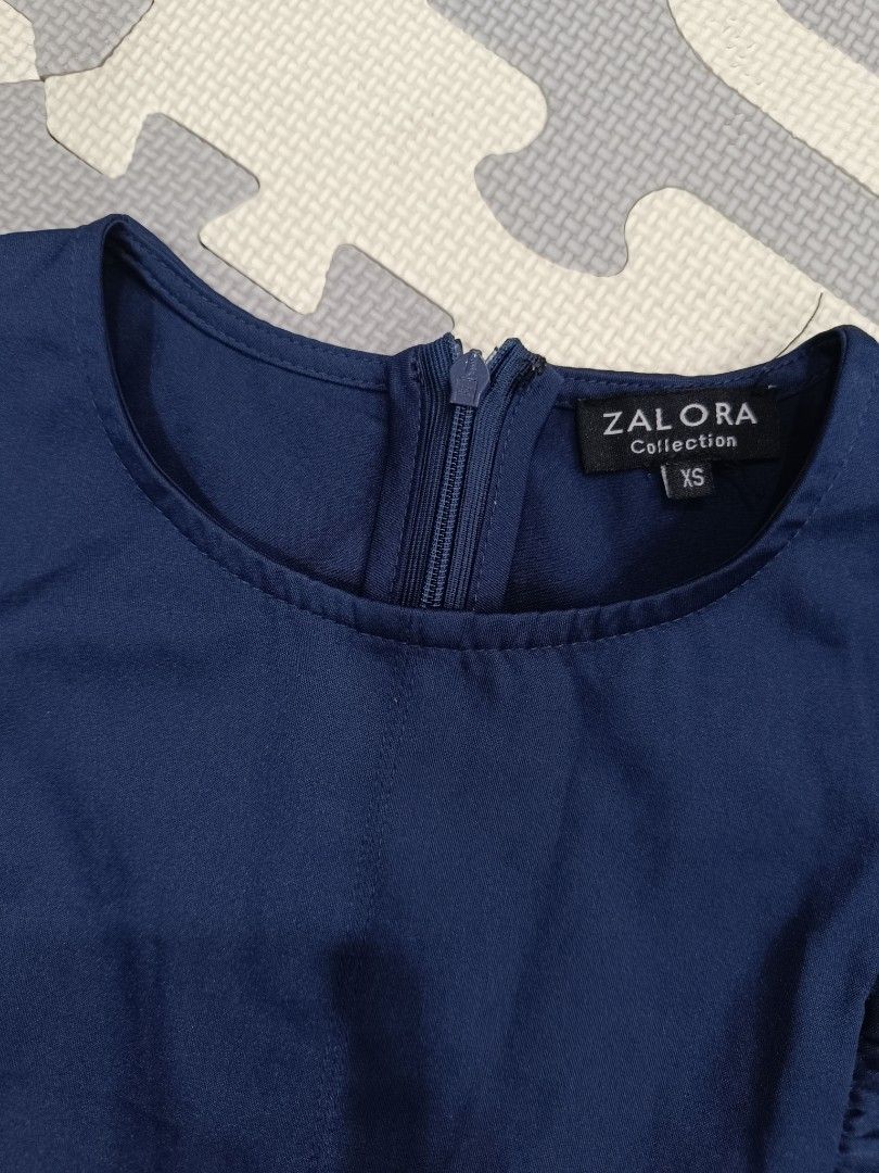 ZALORA Navy Blue Ruffle Dress (Category: Dresses) located in San Fernando. Submitted by absiti (Listing ID 1297574052, Image 2). Description: ZALORA Navy Blue Ruffle Dress Size XS on tag Nice fit, will give your body a curve. Perfect for the cute office look :).