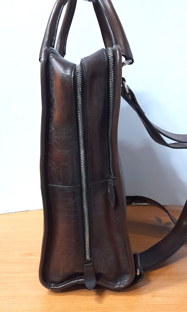 BERLUTI PREMIER JOUR SCRTTIO LEATHER BACPACK (Category: Luxury Bags & Wallets) located in Quezon City. Submitted by brandedcorner (Listing ID 1297679891, Image 3). Description: VERY GOOD CONDITION SIZE LENGTH: 11 inches HEIGHT: 15 inches WIDTH : 5 inches opening 6 inches bottom mild scratches amd rubs due to usage..