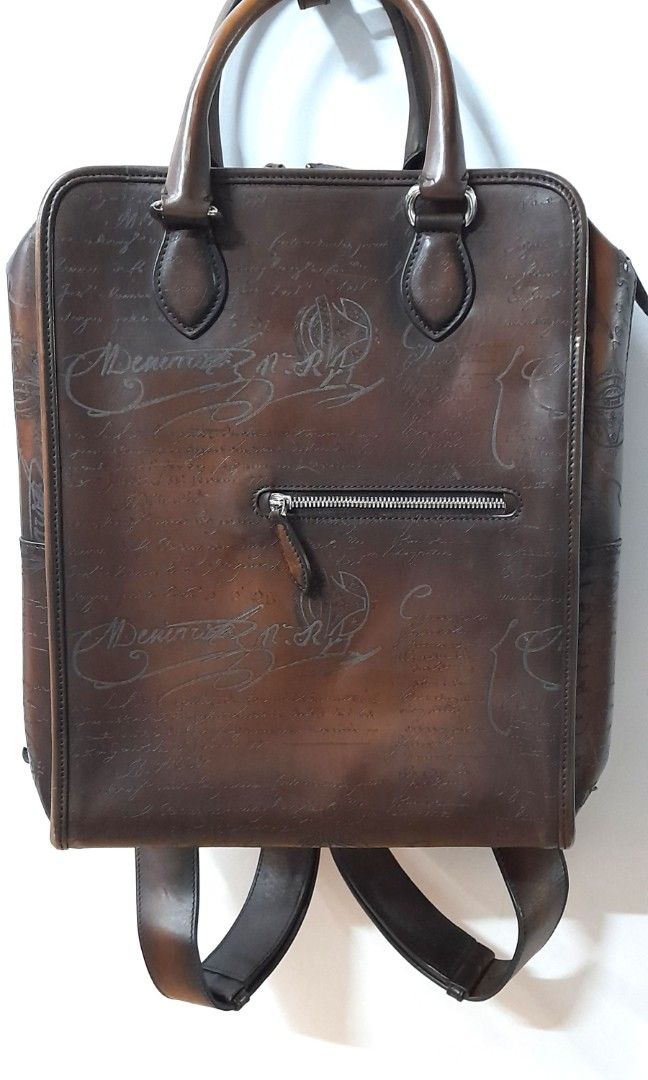 BERLUTI PREMIER JOUR SCRTTIO LEATHER BACPACK (Category: Luxury Bags & Wallets) located in Quezon City. Submitted by brandedcorner (Listing ID 1297679891, Image 1). Description: VERY GOOD CONDITION SIZE LENGTH: 11 inches HEIGHT: 15 inches WIDTH : 5 inches opening 6 inches bottom mild scratches amd rubs due to usage..