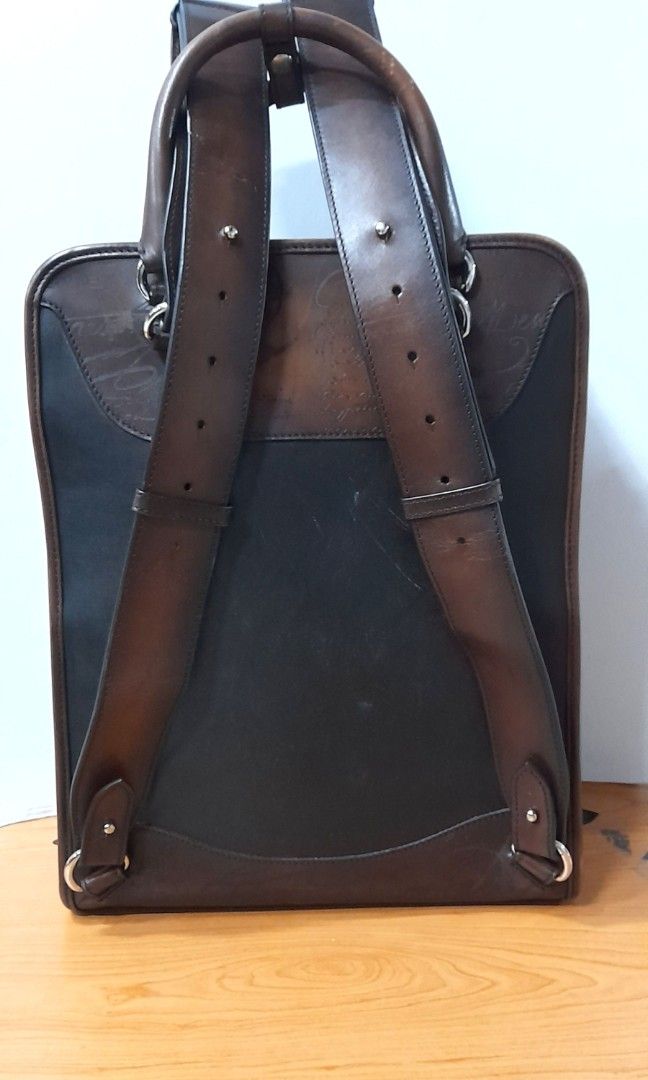 BERLUTI PREMIER JOUR SCRTTIO LEATHER BACPACK (Category: Luxury Bags & Wallets) located in Quezon City. Submitted by brandedcorner (Listing ID 1297679891, Image 2). Description: VERY GOOD CONDITION SIZE LENGTH: 11 inches HEIGHT: 15 inches WIDTH : 5 inches opening 6 inches bottom mild scratches amd rubs due to usage..