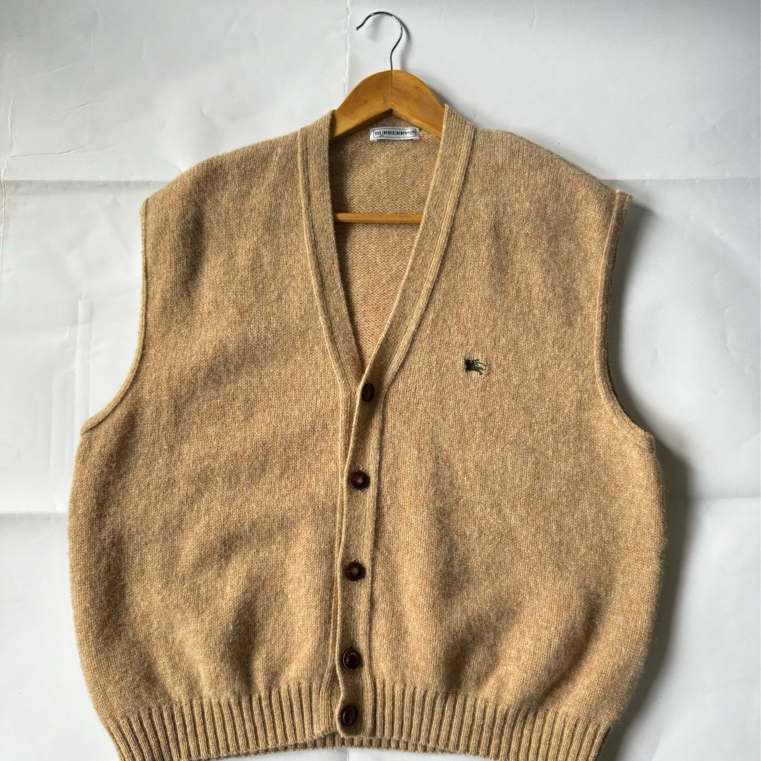 BURBERRYS Knitted Wool Button Down Vest (Category: Vests) located in Quezon City. Submitted by thegentlemensraiment (Listing ID 1297756857, Image 2). Description: BURBERRYS Knitted Wool Button Down Vest Size: 20 on tag W: 23” L: 25” Price: 2000 Note: *Due to lightning, color might vary. *This item is thrifted, hand-picked, secondhand, or thrifted, unless stated as brand new. *No return or exchange policy Price + SF DM for more details..
