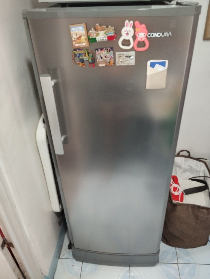 Condura Refrigerator direct cooling (Category: Refrigerators and Freezers) located in Quezon City. Submitted by dkpestcontrolservices (Listing ID 1297577595, Image 1). Description: CONDURA REFRIGERATOR Direct Cool - Single Door 201 Liters Capacity 92 wattage 4.5ft Tall 50 cm width Non Inverter Wala na ung door cover sa freezer other details nasa pic and actual picture posted narin po. Good running condition No issue, may rusty stain lang or peeli