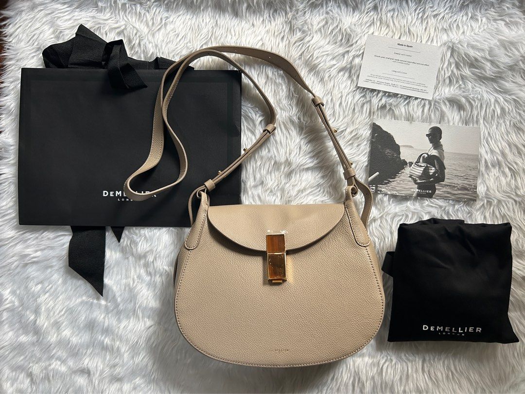 DeMellier Lausanne in Taupe (Regular Size) (Category: Luxury Bags & Wallets) located in Manila. Submitted by 0idiotsavant0 (Listing ID 1297741292, Image 1). Description: Brand new, never used Straight out of the box Purchased directly from the DeMellier London website last month (I got the very last piece) I just attached the strap to try it on Still with protective covers for the clasp hardware Comes complete with dust bag, adjustable strap, car