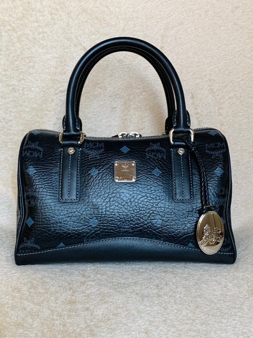 MCM Boston Medallion (Medium Size) (Category: Luxury Bags & Wallets) located in Cavite. Submitted by belle.envie (Listing ID 1297764865, Image 1). Description: ✔︎💯Authentic MCM Boston Bag Medallion ✔︎💯No flaws ✔︎💯Good as New ✔︎💯 No Rubs - No Cracks - No scuffs ✔︎Medium Size 10x 7 x 6 inches ✔︎Super Clean Inside out could pass as Brand new. ✔︎MOP - Gcash - BDO ✔︎Shipping - Lalamove for Cavite nearby places, J&T, LBC COP .