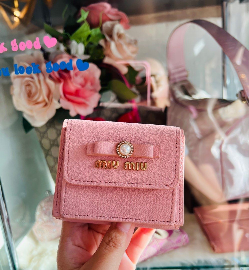 Miu Miu Bowtie Pink Compact Wallet (Category: Luxury Bags & Wallets) located in Dumaguete. Submitted by lovebags.ph (Listing ID 1297792872, Image 1). Description: superrr pretty! 🎀.