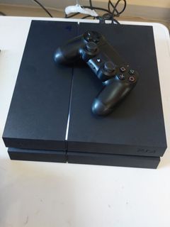 Original Playstation 4 PS4 500GB with 1 DS4 Controller, PS4 Camera, Steering Wheel and 8 PS4 Games