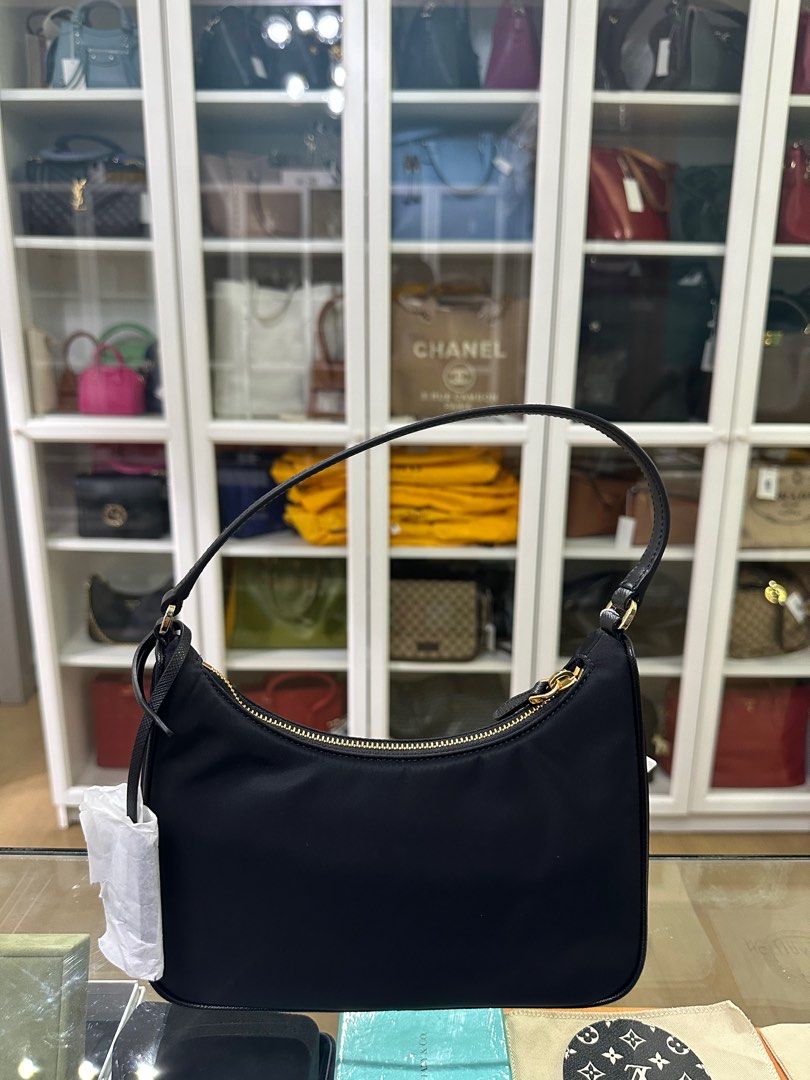 Prada Re-Edition 2005 Tessuto Saffiano Black (Category: Luxury Bags & Wallets) located in Taguig. Submitted by closetcompany (Listing ID 1297725981, Image 3). Description: Prada Re-Edition 2005 Tessuto Saffiano Black 🫧Php 75,000 🫧CONDITION: Brand new 🫧INCLUSIONS: dust bag, paper bag, box, information/care cards, ribbon and gift receipt 🫧Modes of Payment: Cash BDO credit card (Up to 12 mos installment with interest) Layaway Paypal Accepted Ban
