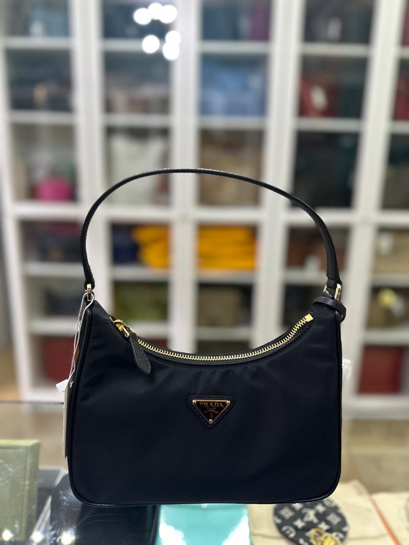 Prada Re-Edition 2005 Tessuto Saffiano Black (Category: Luxury Bags & Wallets) located in Taguig. Submitted by closetcompany (Listing ID 1297725981, Image 1). Description: Prada Re-Edition 2005 Tessuto Saffiano Black 🫧Php 75,000 🫧CONDITION: Brand new 🫧INCLUSIONS: dust bag, paper bag, box, information/care cards, ribbon and gift receipt 🫧Modes of Payment: Cash BDO credit card (Up to 12 mos installment with interest) Layaway Paypal Accepted Ban