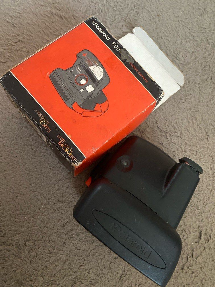Vintage Polaroid 600 extreme instant camera (Category: Cameras) located in Paranaque City. Submitted by bailey_cade (Listing ID 1297698326, Image 2). Description: BROKEN, not usable. For display only With box. Old and broken, can be used for display only .