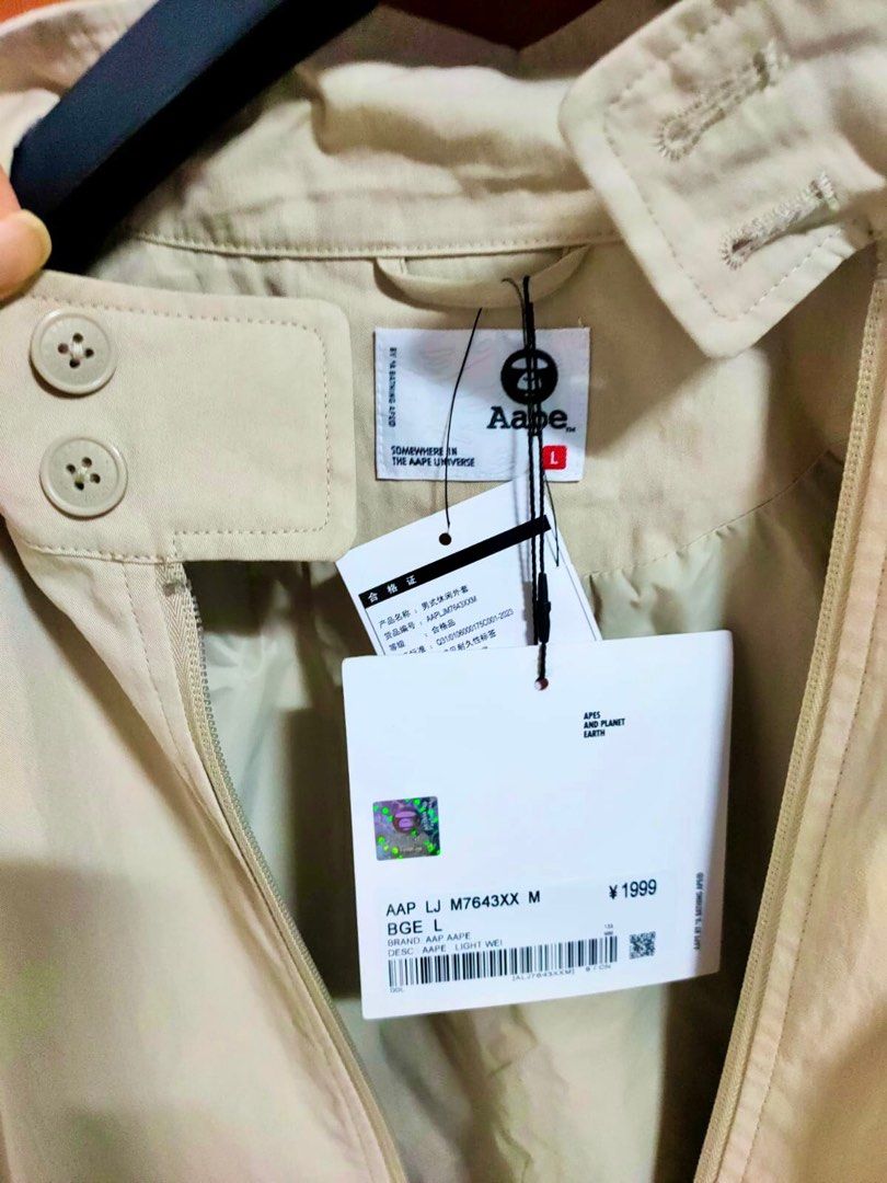 *SALE* Aape BY *A BATHING APE® Light Weight Drizzler Jacket Beige AAPLJM7643XXMBGE (Category: Coats, Jackets and Outerwear) located in Singapore. Submitted by nofrillsfactoryoutlet (Listing ID 1297883786, Image 9). Description: Usual : $388 SUPER HOT DEAL : $299 100% Authentic and Brand New with Tags and packaging. Direct from Aape BY *A BATHING APE® outlet in Beijing. Brand : Aape BY *A BATHING APE® Design : Moon Face Embroidered Drizzler Jacket