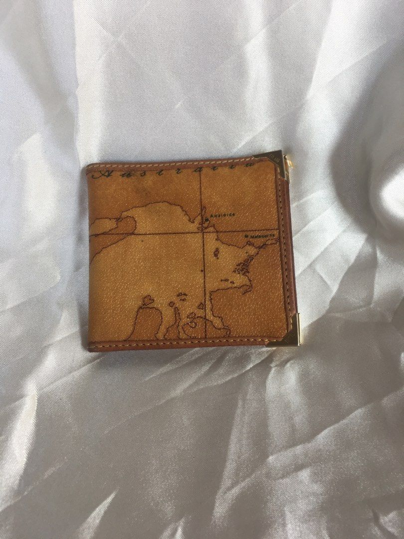 Alviero Martini Bifold Wallet - Unisex (Category: Luxury Bags & Wallets) located in Tuguegarao City. Submitted by prelovedbykhelria (Listing ID 1297818520, Image 1). Description: Authentic, coded.