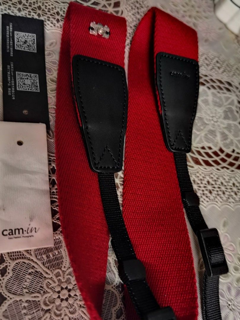 Cam in camera strap (Category: Mounts & Holders) located in Guagua. Submitted by goodbuysathome (Listing ID 1297840322, Image 1). Description: Orig Cam in replacement camera strap Add sf 75 Gcash payment.