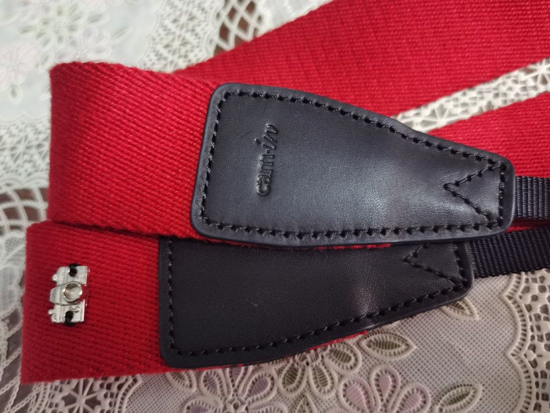 Cam in camera strap (Category: Mounts & Holders) located in Guagua. Submitted by goodbuysathome (Listing ID 1297840322, Image 2). Description: Orig Cam in replacement camera strap Add sf 75 Gcash payment.