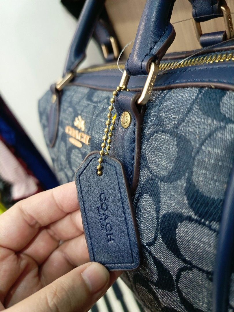 Coach Rowan Satchel Boston (Category: Luxury Bags & Wallets) located in Mabalacat. Submitted by fangal_finds (Listing ID 1297894249, Image 2). Description: Coach Rowan Satchel Boston Bought in Vietnam No signs of usage, No issue RFS: Bag small for my liking.