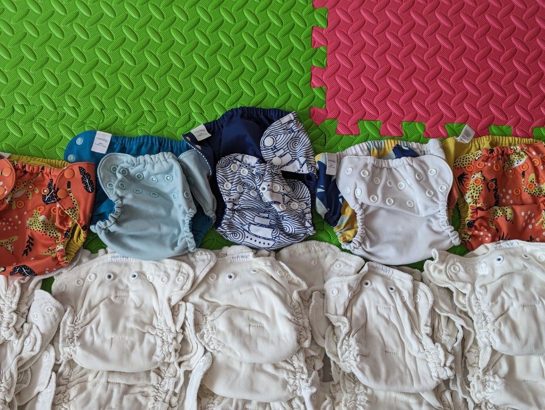 Esembly Cloth Diaper Bundle (Category: Diapers & Baby Wipes) located in Balanga. Submitted by crienahouse (Listing ID 1297881945, Image 2). Description: Esembly Diapers from the States Size 1 (7-17lbs, birth-6mos approx) 26 Inners - organic cotton (the only brand I could find in this fabric, no stains) 5 outers Take all only, last price Will offer 4 overnight pads for free for buyer total of $430 worth of items. this saved us a lot of money and t