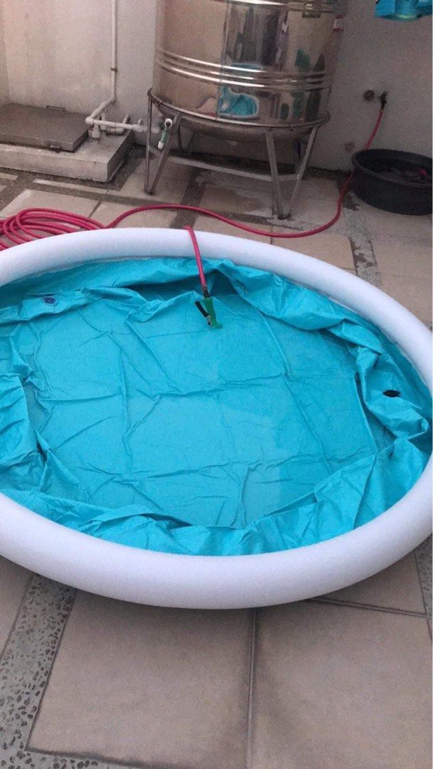 Inflatable swimming pool blue (1.83M x 51 cm) (Category: Water Sports) located in Quezon City. Submitted by flatfootedmd (Listing ID 1297954214, Image 3). Description: Only used once. Can hold 232 gallons of water 16 inches height. No damage. Price negotiable Reason for selling - cleaning space.