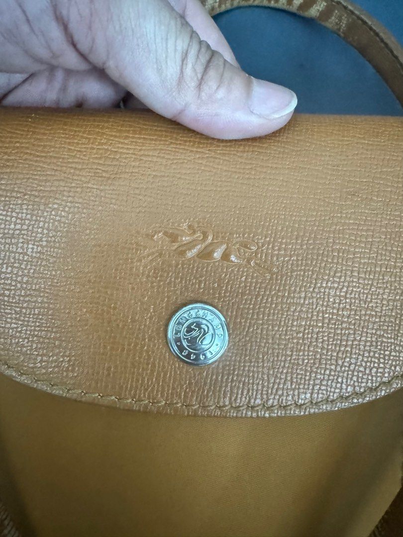 Authentic Longchamp Le Pliage Small (Category: Luxury Bags & Wallets) located in Quezon City. Submitted by itsnotmeitsu (Listing ID 1297839055, Image 3). Description: missing long strap.