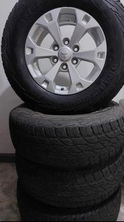 Mitsubishi Strada GLS mags 265 70 R17 Accelera Omikron All Terrain tires