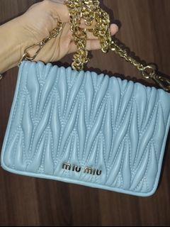 Miu Miu in Matelassé leather purse in metal chain strap