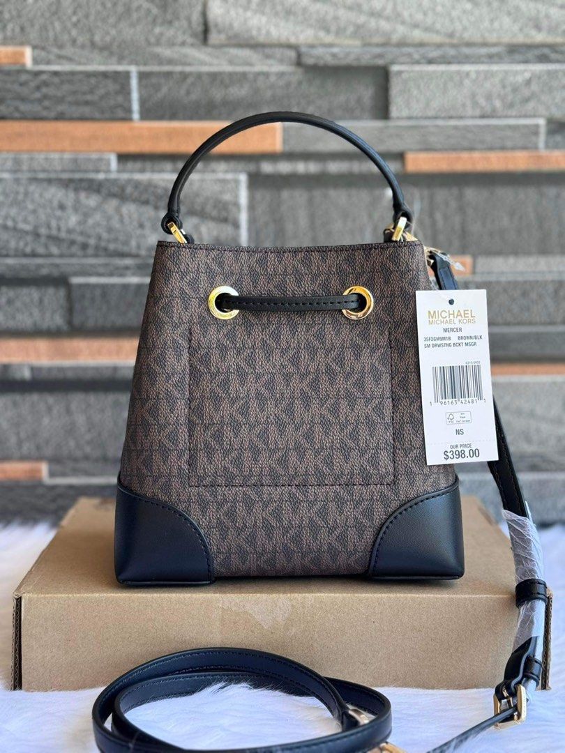MK small mercer bucket bag (Category: Cross-body Bags) located in Mandaluyong City. Submitted by stuffnmore (Listing ID 1297904998, Image 3). Description: Mk small mercer bucket bag Pinas onhand Inclusion tag and carecard Guaranteed original and new Product details Bucket bag • Pebbled leather • 100% leather • Gold-tone hardware • 7”W X 7.5” H X 4.5”D • Adjustable strap: 20.5”-24” • Handle drop: 3” • Exterior details: removable strap • Interior d