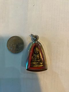 Old bronze buddha in pendant