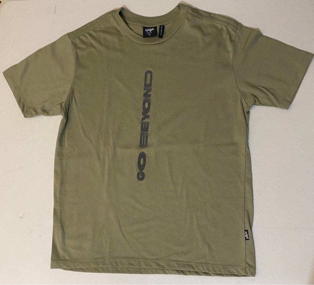 OXYGN Go Beyond Taupe Shirt (Category: Shirts) located in Valenzuela. Submitted by adventurousforester (Listing ID 1297894034, Image 1). Description: Size: XS - Ship through Lalamove/Grab - Shipping fee c/o buyer.