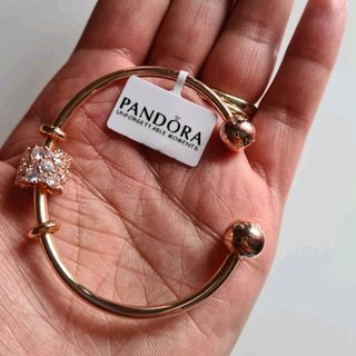 Pandora rosegold open bangle with set of 1 Rosegold shiny charm pendant