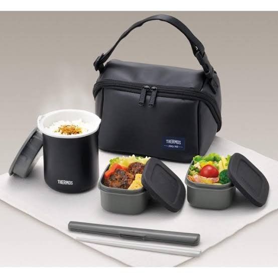 Thermos Japan Lunch Set with Box (Category: Food Organization & Storage) located in Manila. Submitted by gamitnimoi (Listing ID 1297918275, Image 1). Description: Thermos Japan lunchbox set with box. Issues: No chopsticks, but all else complete. Box with some water damage due to storage. Lunch bag flaking due to storage. Small dent in food jar. All else in good condition..