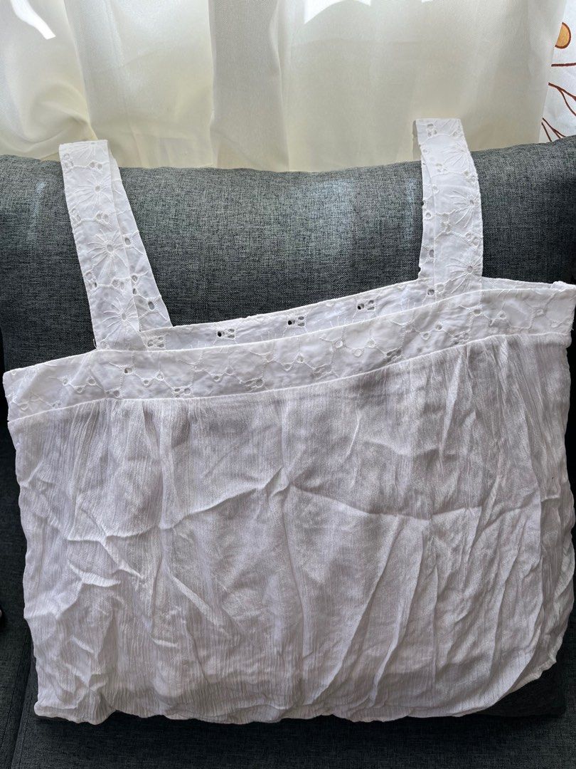 White Eyelet Summer Top (Category: Sleeveless) located in Manila. Submitted by arceeb (Listing ID 1297872925, Image 2). Description: Eyelet Top Supeeeer cute and comfy for this summer! Size Large.