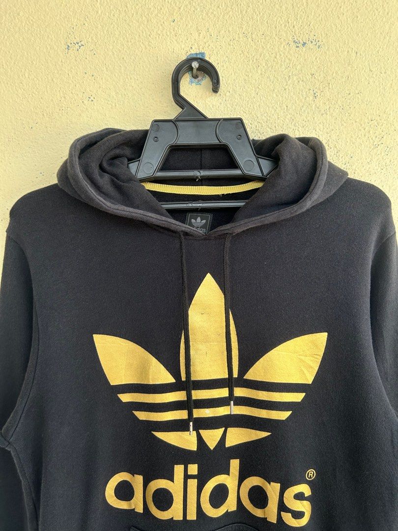 Adidas Golden Big Logo Hoodie Men s Fashion Tops Sets Hoodies on Carousell