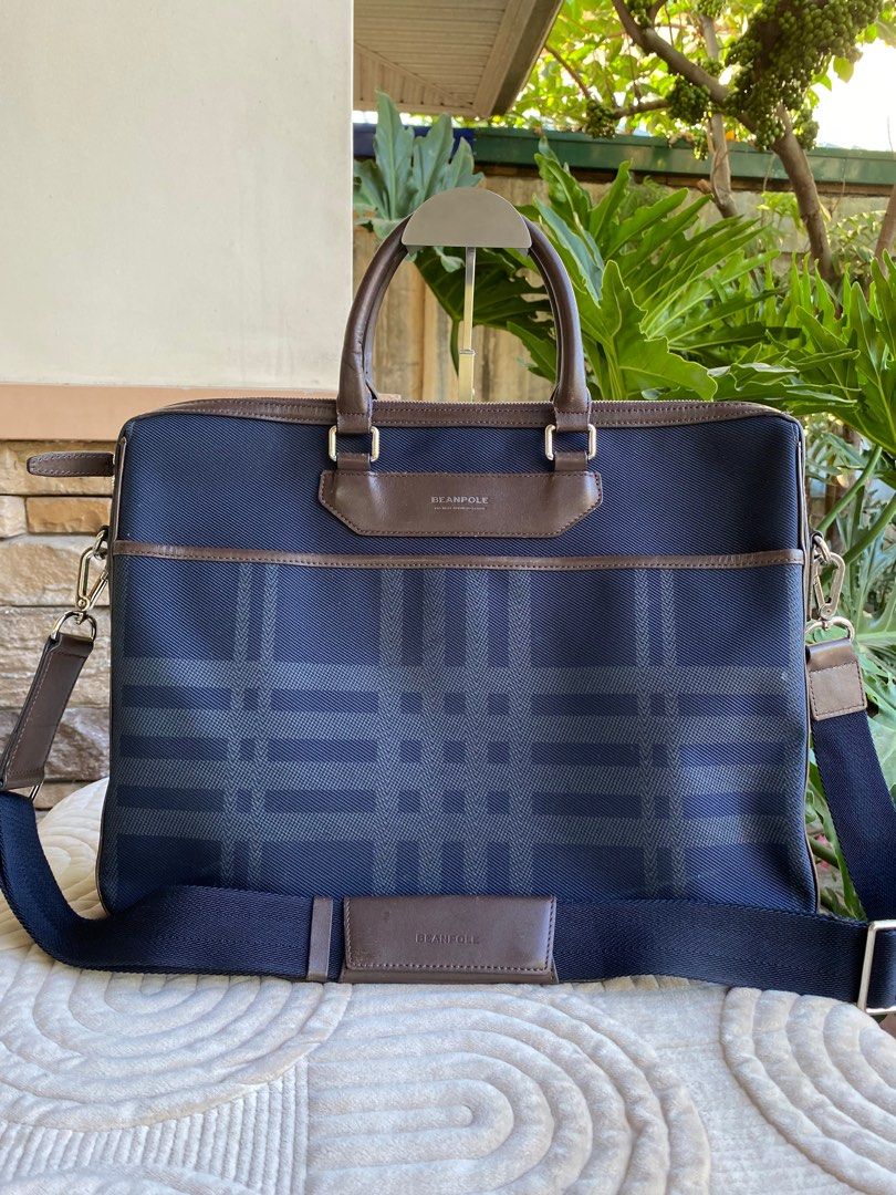 BEAN POLE Laptop Bag (Category: Briefcases) located in Baliuag. Submitted by nylinel (Listing ID 1297958791, Image 1). Description: 👜 BEANPOLE Laptop Bag 💼 Color: Brown and Navy Blue 👜 Material: Canvas and Leather ⛔️ Size: L- 15” x H- 12” x W- 3” 👛 Guaranteed authentic 💯 🎒 preloved - with minimal signs of used.