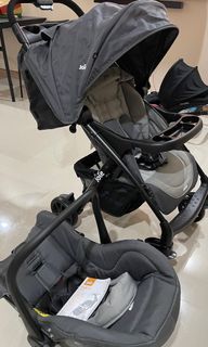 BRAND NEW JOIE MUZE LX WITH INFANT CARSEAT
